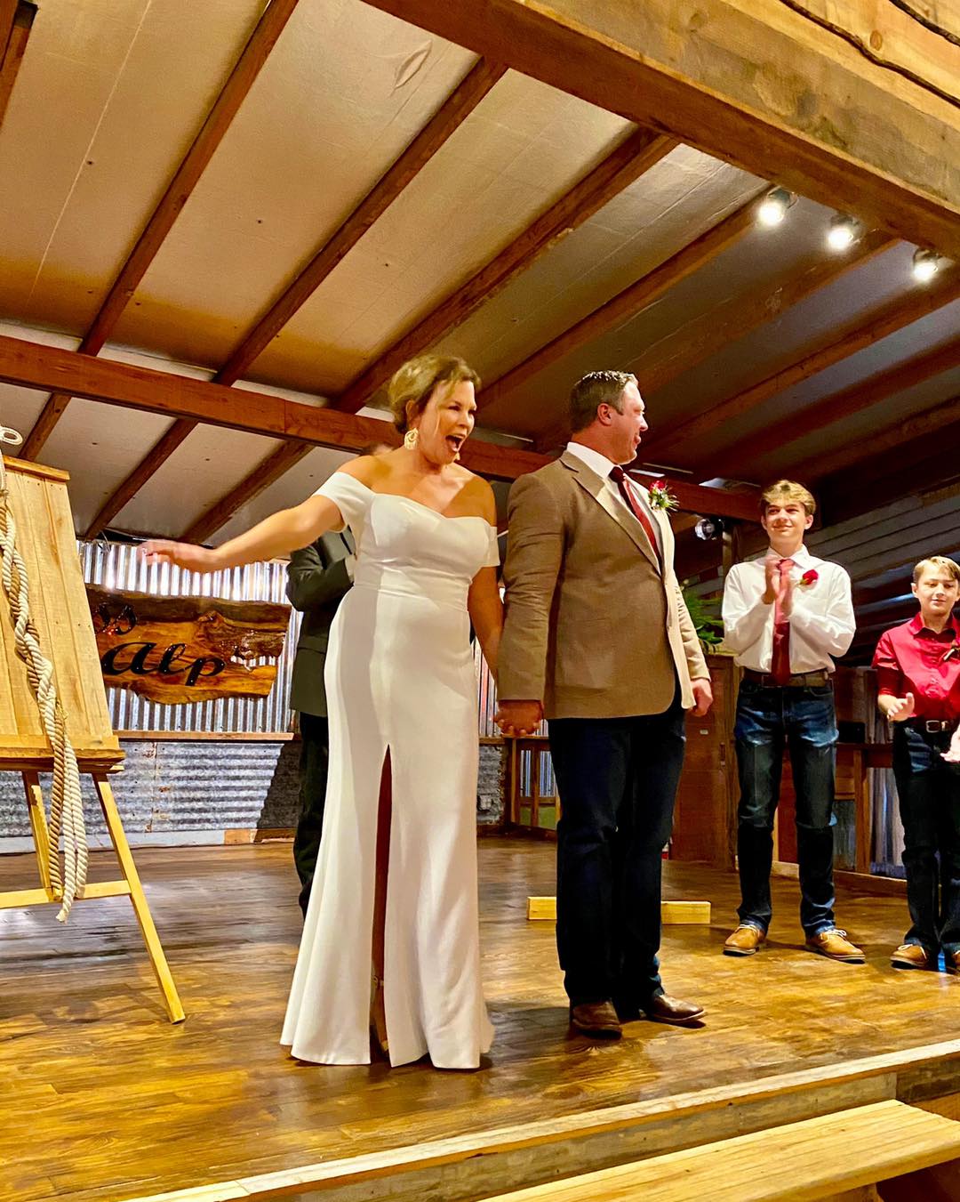 bride and groom walking up aisle